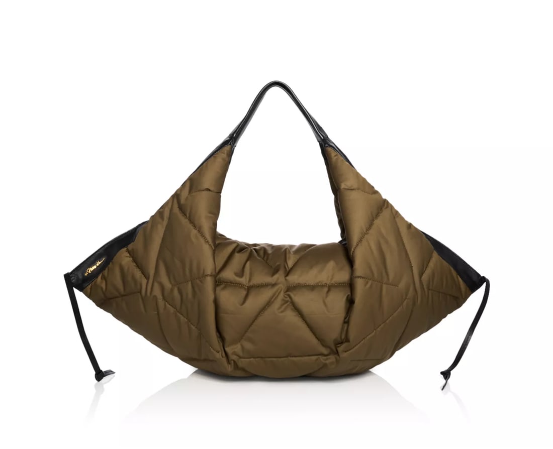Phillip Lim quilted olive green nylon & leather uniquely shaped satchel/ tote: Description: Double handles, 11" drop Dimensions: 25.2"W x 11.8"D x 13.4"H Zip closure Interior slip pocket Knotted thong detail at sides Quilted puffed design Lining Main: 100% polyester; trim: leath
