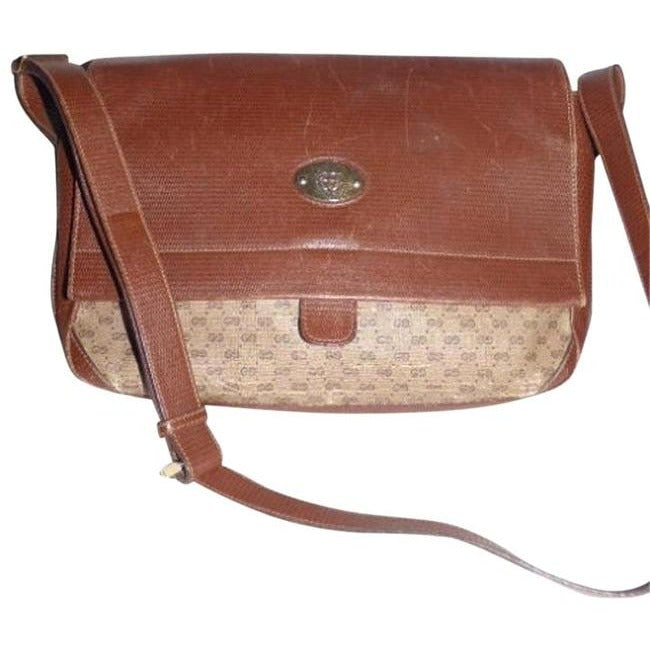 Gucci Vintage Shades Of Brown Small G Logo Print Leather Coated Canvas Cross Body: For sale is a Gucci, small G logo coated canvas & textured leather, large, roomy, cross body/messenger bag in shades of brown with a leather front flap! This is a unique version of the classic Gucci c