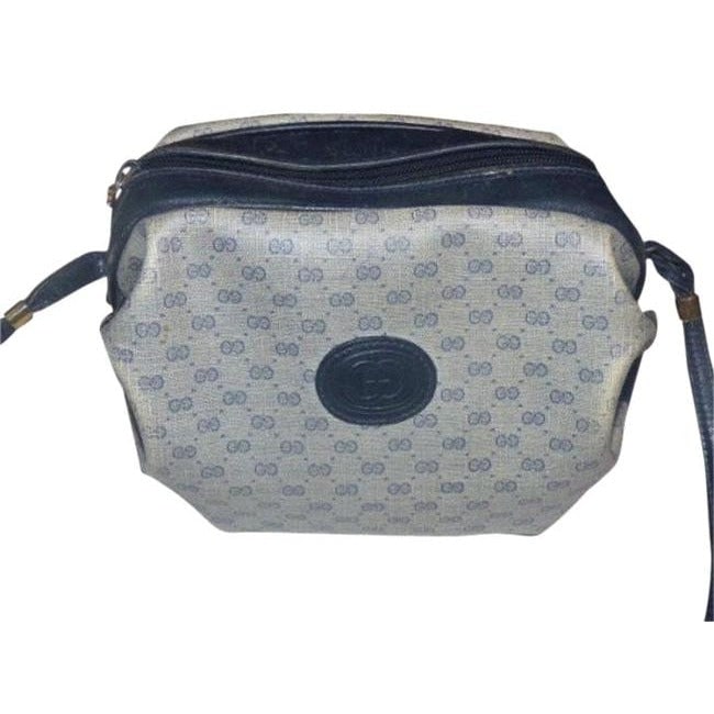Gucci Vintage Blue Leather And Gg Leather Cross Body Barrel Bag: * For sale is a vintage, Gucci, blue, small G logo print coated canvas & navy leather, barrel shape, cross body or shoulder bag with gathered sides and unused strap! This rare and unusual style purse 