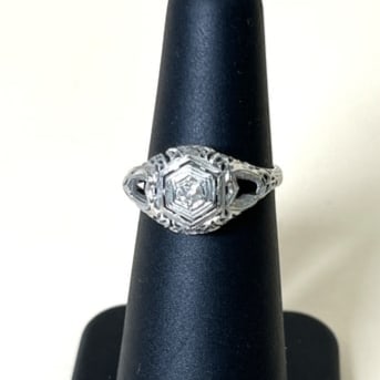 18k White Gold Art Deco Antique Diamond Ring size 5.5: This antique ring features a diamond with a stunning art deco white gold setting. It is a size 5.5 and weighs