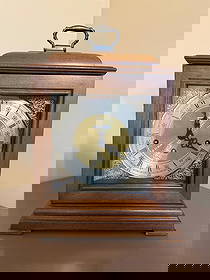 Howard Miller Graham Bracket Mantel Clock: MANTEL CLOCK, The Graham Bracket Mantle Clock features a rich Windsor Cherry finish on select hardwoods and veneers showcasing traditional decor at its finest. It can complement any home with its vari