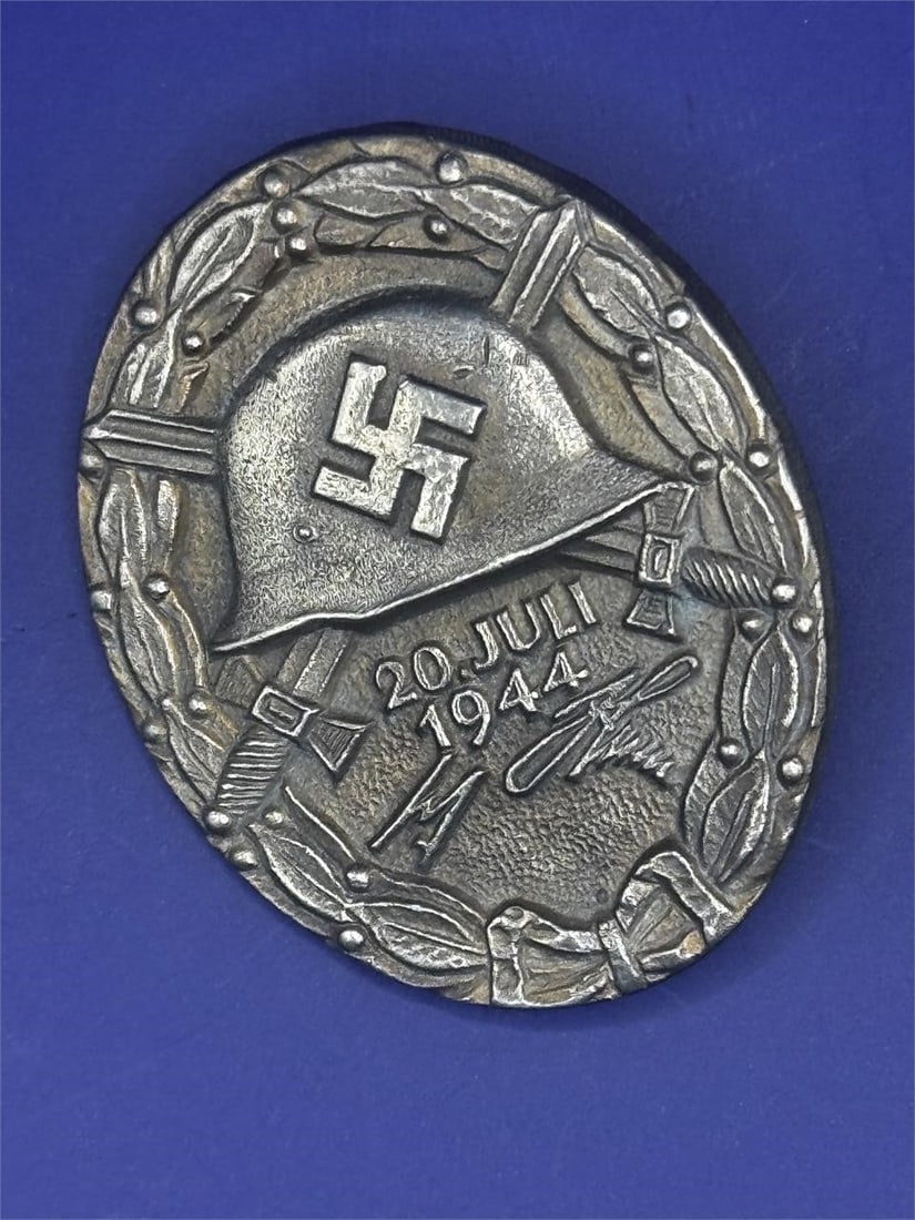German 1944 Wound Badge in Silver: Dimensions: 1in x 2inWW2 German Wound Badge 20th July, 3rd Class