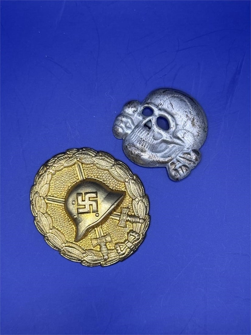 WW2 Wound Badge & Skull Badge: Dimensions: 1.5in and 1inGerman 1st pattern wound badgeThe "Totenkopf" (German for "death's head") was an old international symbol for death and danger, but was notably adopted by the SS.