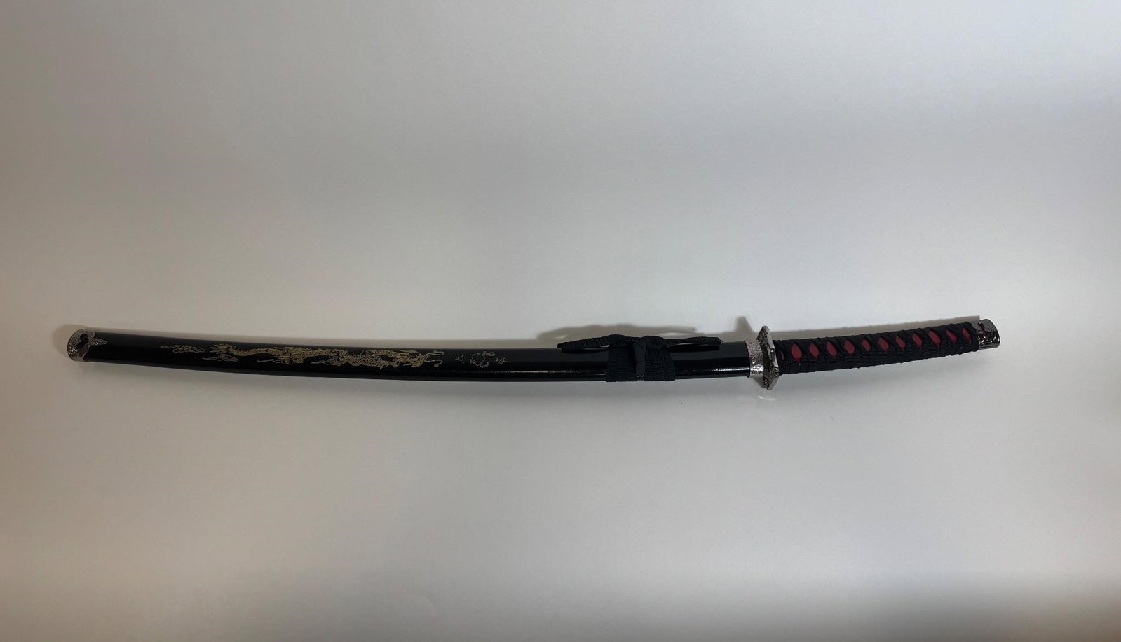Decorative Japanese Katana Samurai Sword (B&R): Decorative Japanese Katana Samurai Sword (Black & Red) w/ gold details.Length: 40in
