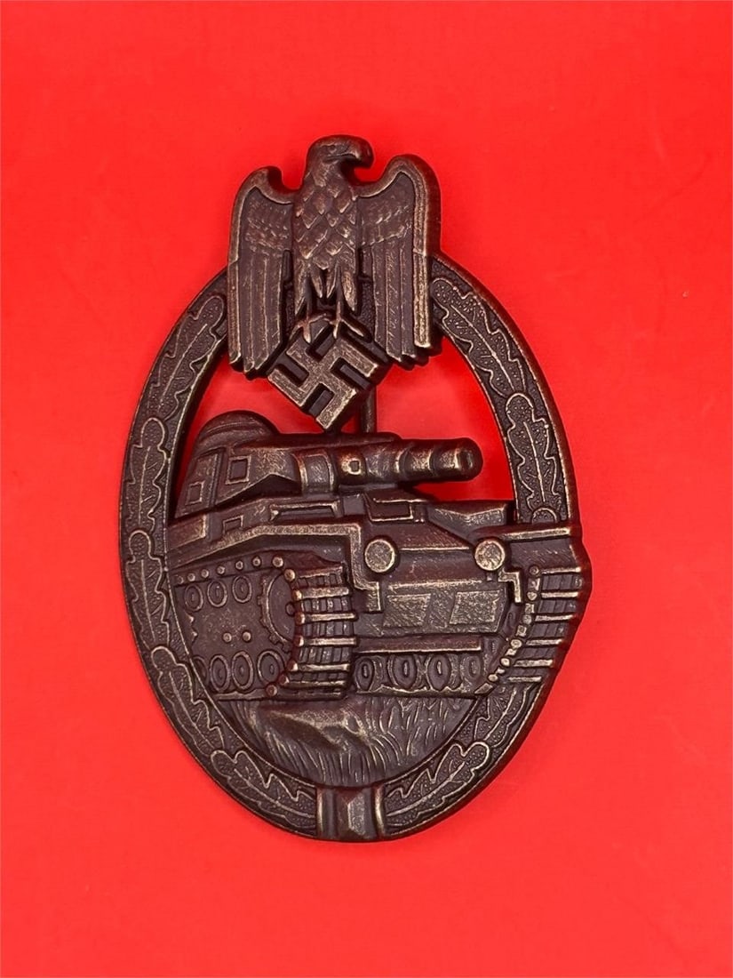 WWII German Panzer Assault Badge: Dimensions: 2.5in x 1.5inA military decoration of Germany awarded to armored division troops during World War II. Award Criteria: It was awarded to all ranks of tank personnel (commander, driver, gunn