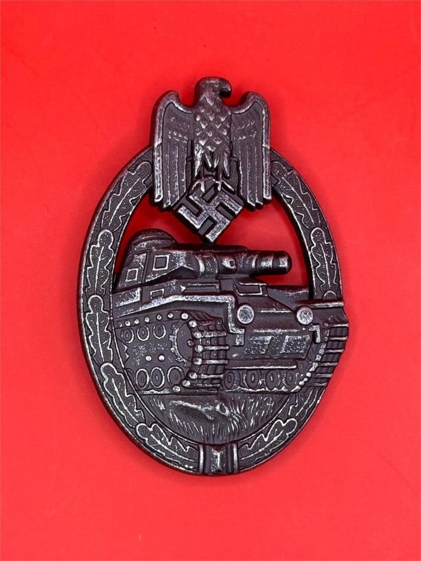 WWII German Panzer Assault Badge: Dimensions: 2.5in x 1.5ina military decoration of Germany awarded to armored division troops during World War II. Award Criteria: It was awarded to all ranks of tank personnel (commander, driver, gunn