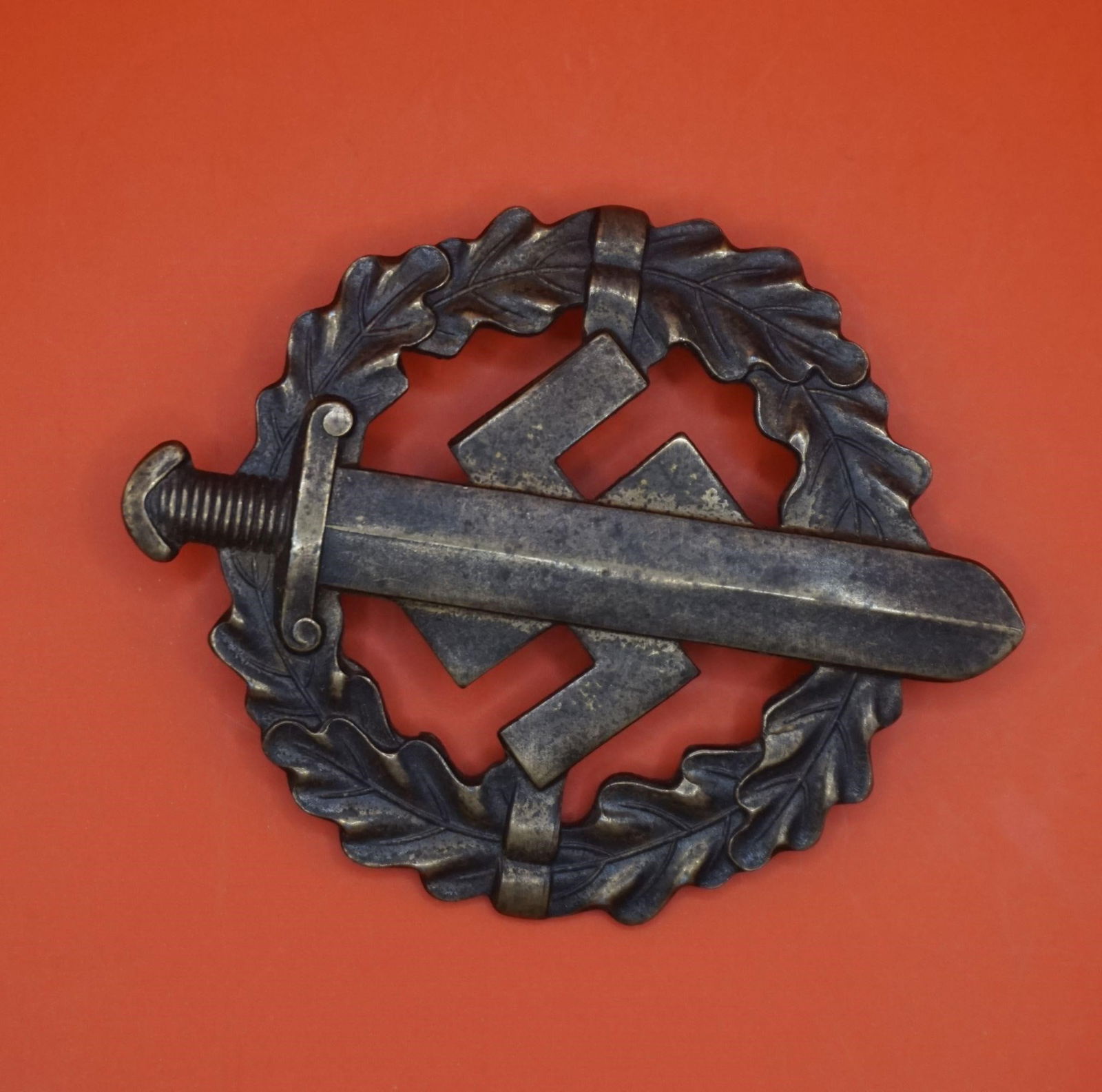 WWII German SA Sports Badge: A SA Sports Badge (SA-Sportabzeichen) in the bronze grade, a decoration of Nazi Germany. Instituted on November 28, 1933, by Ernst Röhm, the badge was awarded to SA and SS personnel who passed physic