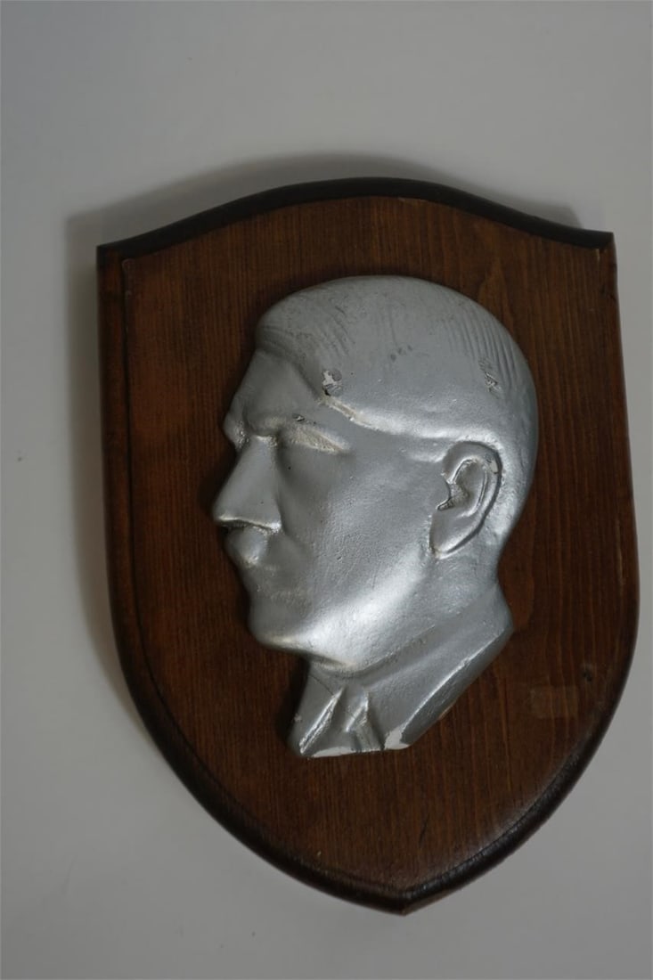WWII GERMAN REICH ADOLF HITLER WOOD WALL PLAQUE: WWII German Reich Adolf Hitler wood wall plaque, featuring a period-style carved or relief portrait mounted on a wooden backing. A historical display piece representative of Third Reich-era memorabili