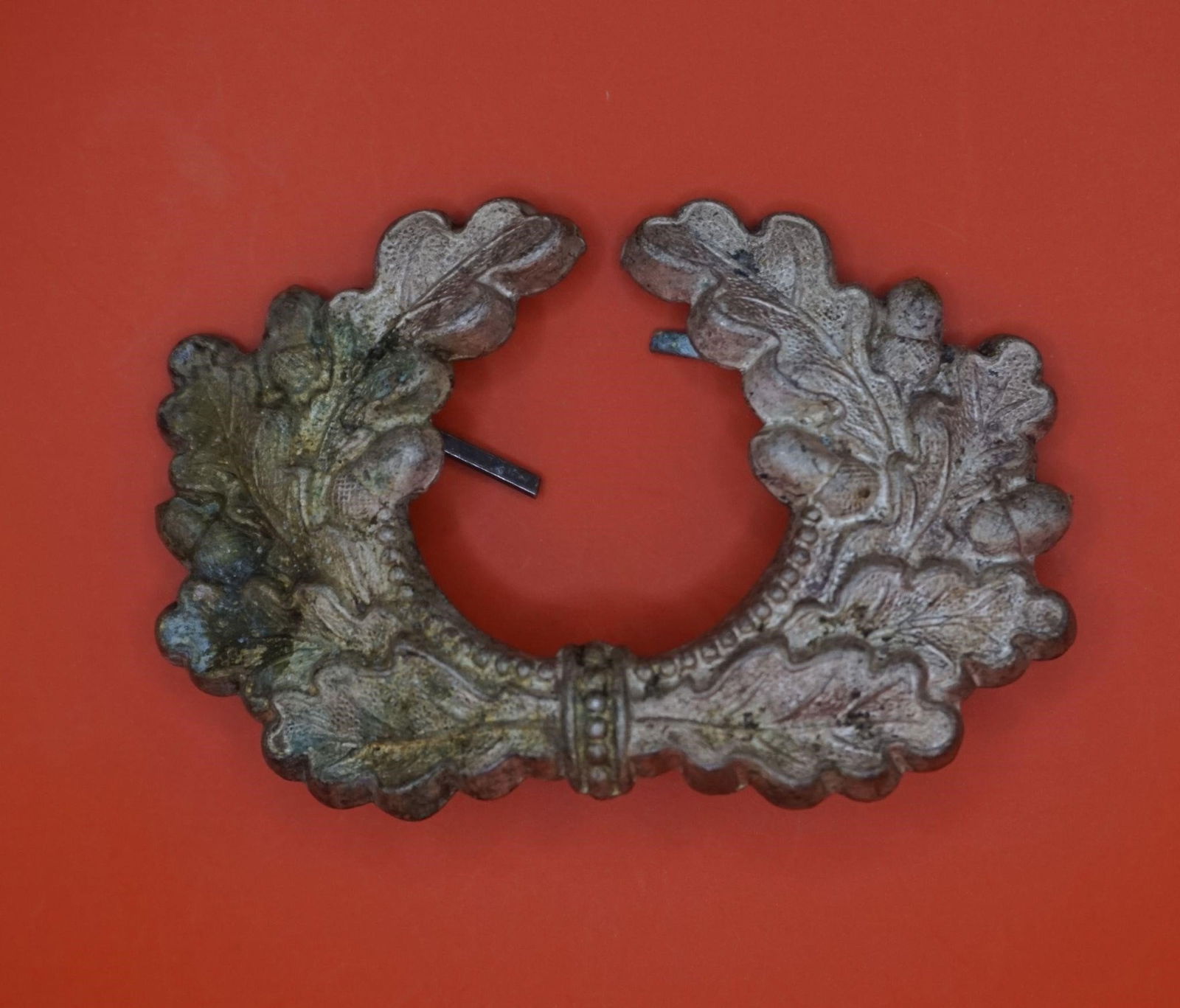 WWII German Army (Heer) Visor Cap Oak Leaf Wreath: This is a World War II German Army (Heer) visor cap oak leaf wreath (Mützen Eichenlaubkranz). This insignia was worn by all ranks of the Wehrmacht Heer on the front of the Schirmmütze (peake