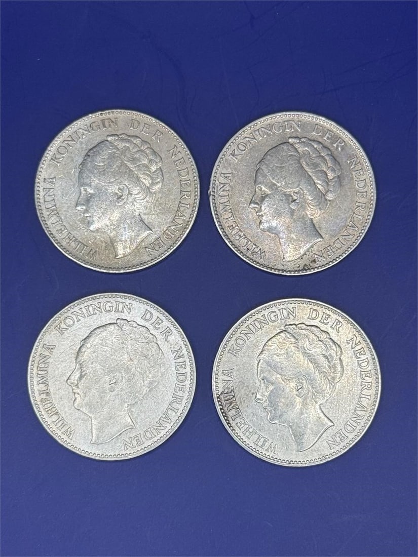 Set of 4, Netherlands 1 Gulden: Size:1inDated 1928,1939Netherlands 1 Guldenoins featuring the Dutch coat of arms on one side and the reigning monarch, Queen Wilhelmina, on the other. These coins were minted between 1922 and 1945.
