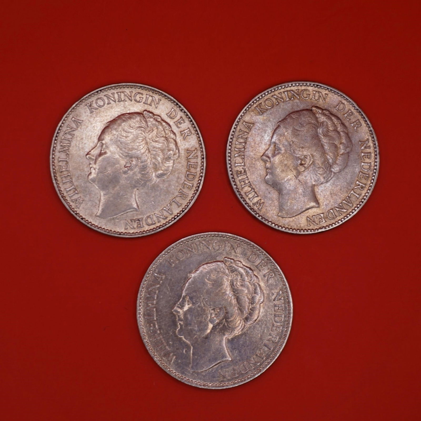 1931 Netherlands Queen Wilhelmina Silver Gulden: Three 1931 Netherlands silver 1 Gulden coin featuring Queen Wilhelmina, struck in .720 silver.