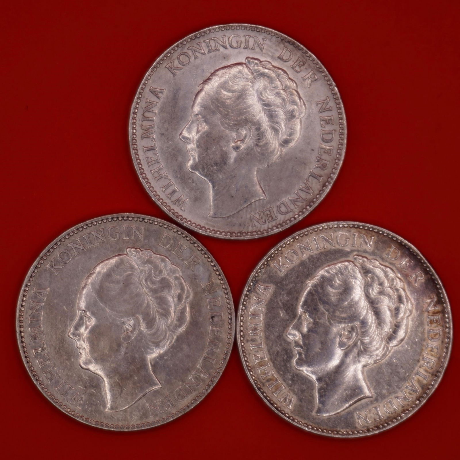1931 Netherlands Queen Wilhelmina Silver Gulden: Three 1931 Netherlands silver 1 Gulden coin featuring Queen Wilhelmina, struck in .720 silver.