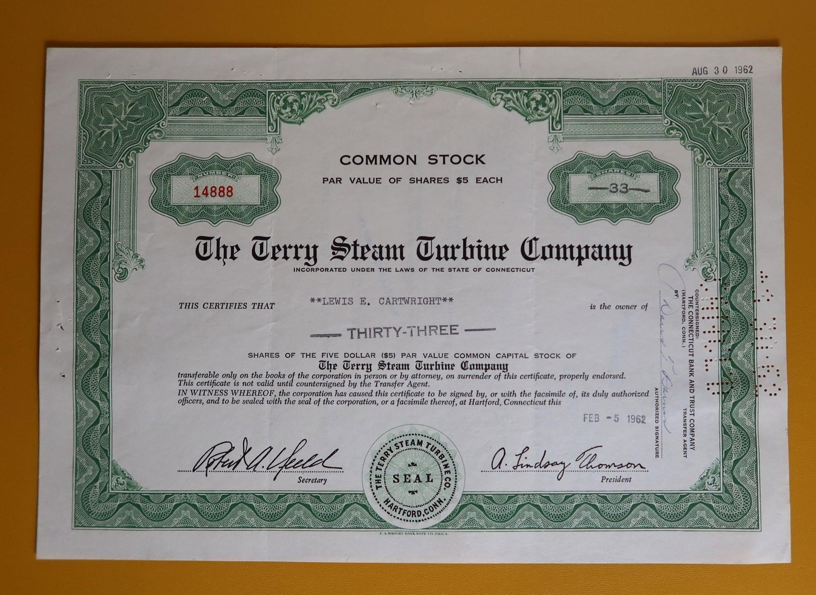 Terry Steam Turbine Co. Common Stock Certificate: A collectible common stock certificate for The Terry Steam Turbine Company, issued on February 5, 1962, to Lewis E. Cartwright for thirty-three shares. Company: The Terry Steam Turbine Company,
