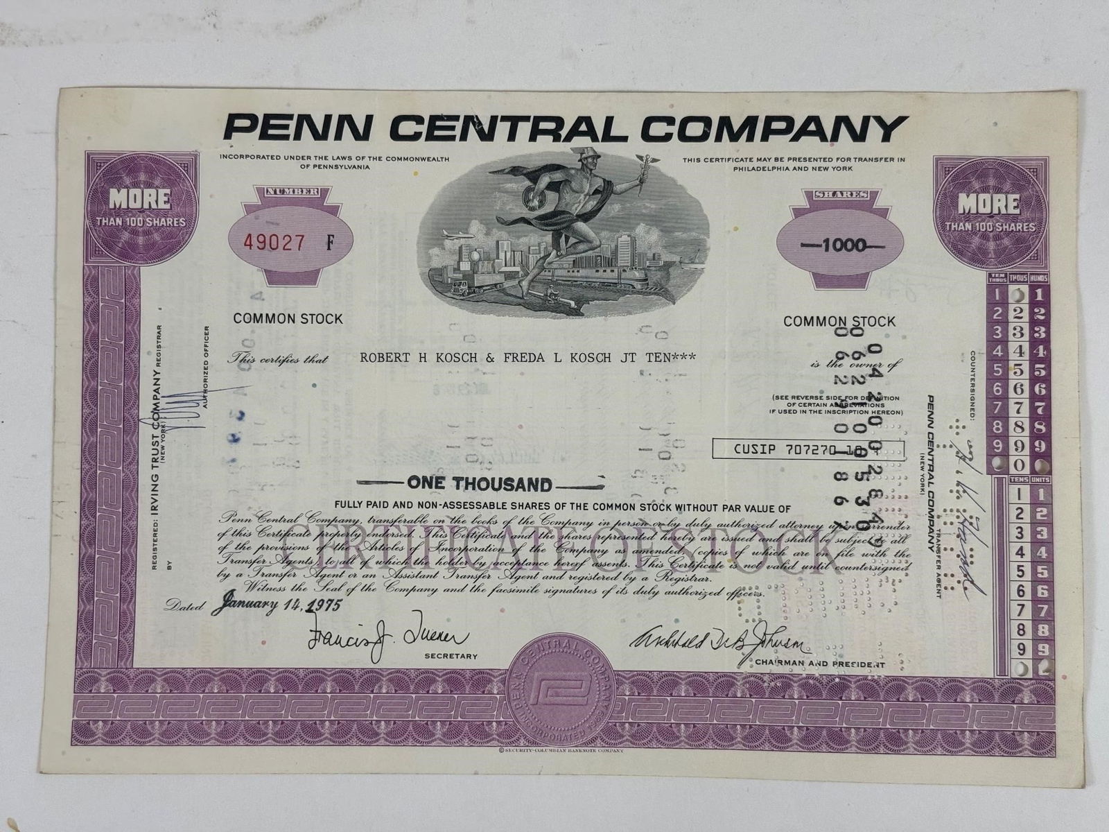 Penn Central Company Common Stock Certificate: Collectible purple Penn Central Company common stock certificate dated January 14, 1975, for one thousand shares.