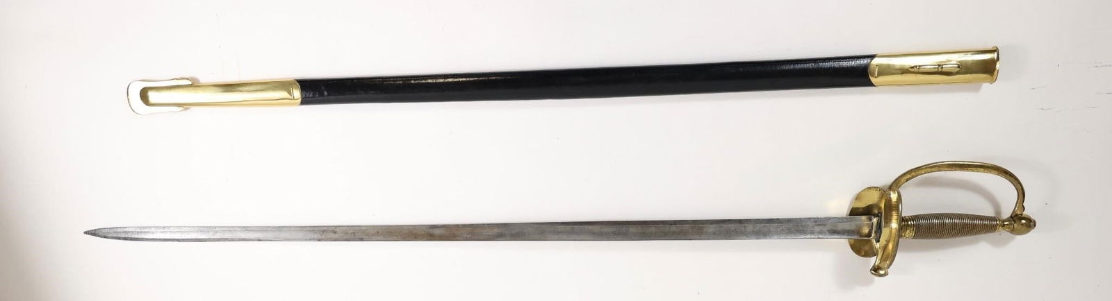 US Model 1840 Army NCO/Musician Sword: The item is a US Model 1840 Army Non-Commissioned Officer's or Musician's sword. This model was adopted in 1840 and carried by sergeants during the Mexican War and the Civil War. The sword was produce