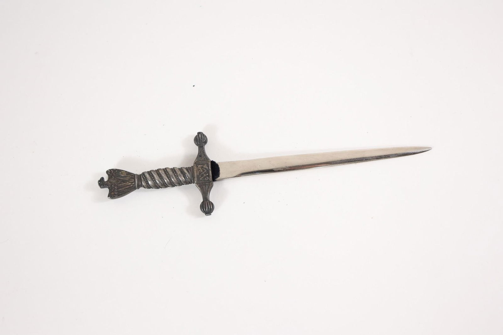 WWII-Style Kriegsmarine Letter Opener: WWII-style Kriegsmarine letter opener or mini dagger. The handle features an anchor; brown leather wedge between handle and blade.
