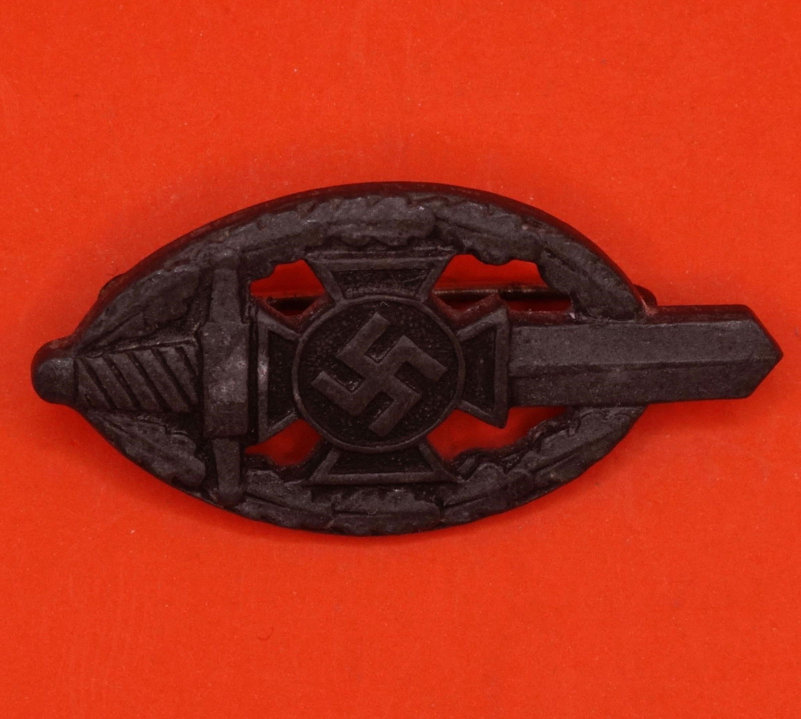 Germany III Reich NSKOV Badge: German Third Reich NSKOV (National Socialist War Victim's Care) badge, metal construction with pin back, typical period design, good condition.