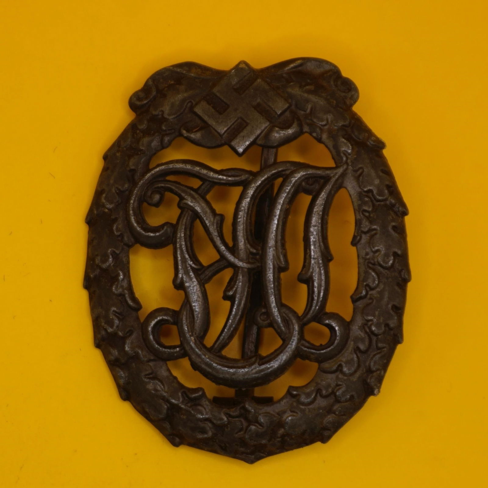 German DRL Sports Badge in Bronze: Original German DRL Sports Badge in bronze, maker marked Jena Werstein. Nice original finish with minor age wear; displays very well. Classic physical fitness award used during the interwar period and