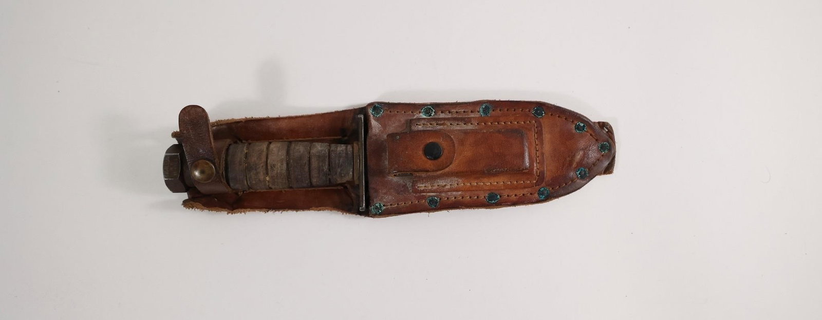 Vietnam War U.S. Air Force Pilot Survival Knife: Original Vietnam War-era U.S. Air Force pilot survival knife by Camillus, 5" blade dated April 1968, with correct leather sheath. Blade shows light service wear with much of the original finish remain