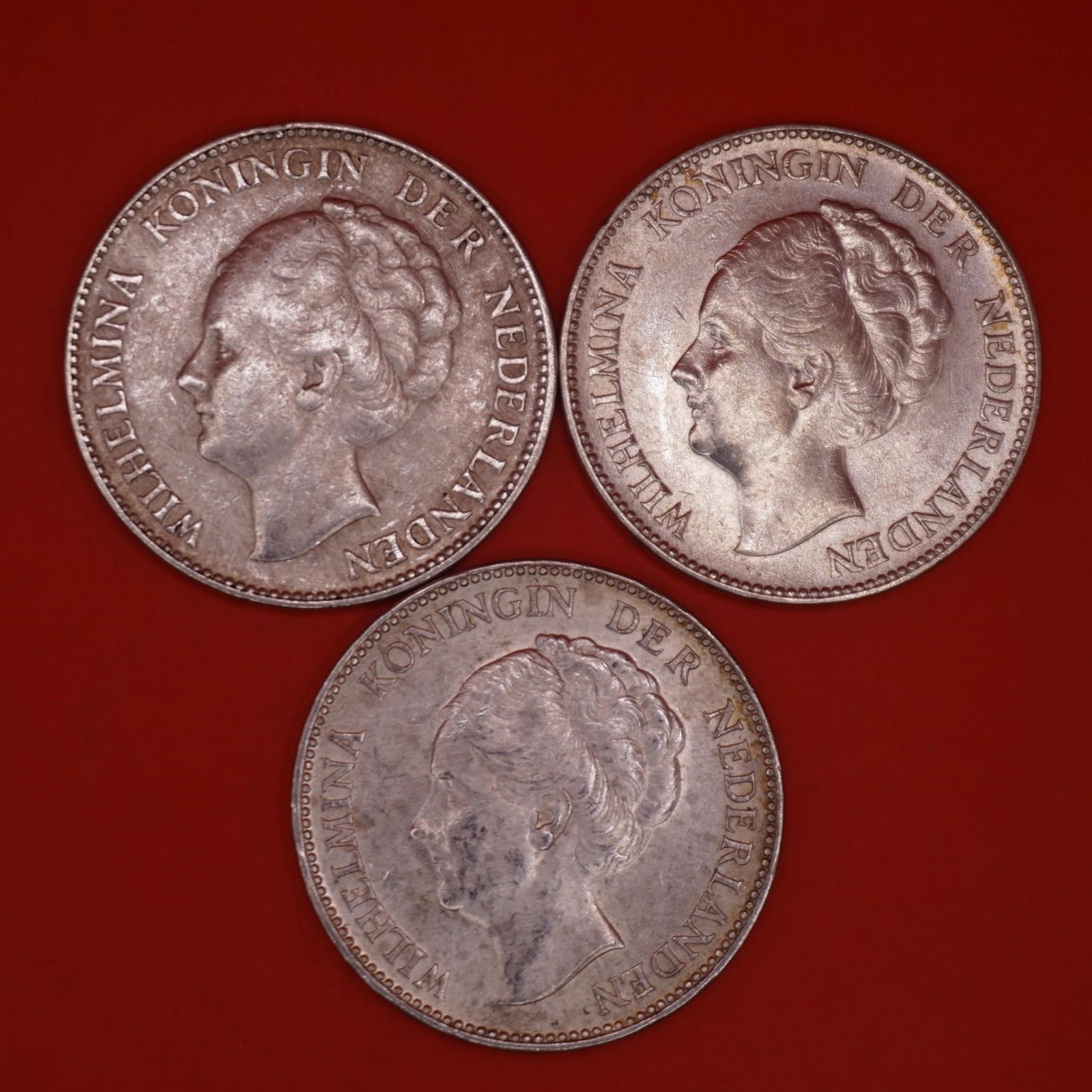 1931 Netherlands Queen Wilhelmina Silver Gulden: Three 1931 Netherlands silver 1 Gulden coin featuring Queen Wilhelmina, struck in .720 silver.