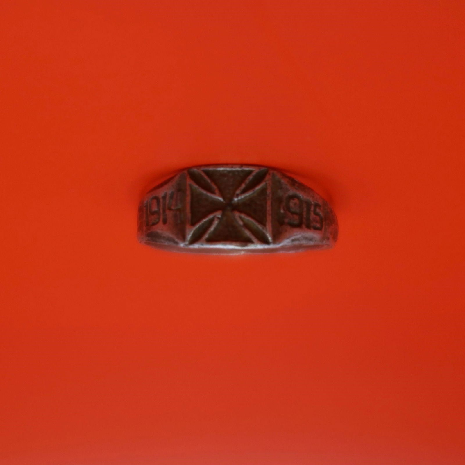 WWI German Silver Ring: WWI German Silver Ring featuring a raised Maltese-style cross on the front and simple engraved side details. Shows age wear and patina throughout, giving it a well-worn antique look.