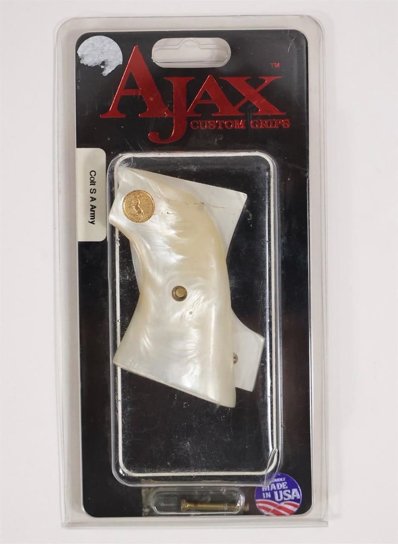Ajax Custom Grips for Ruger Blackhawk Vaquero: This is a set of Ajax Custom Grips for a Ruger Blackhawk, Vaquero, or Single Six revolver, made from a material described as ivory polymer or White Pearlite. These grips are designed to fit the older