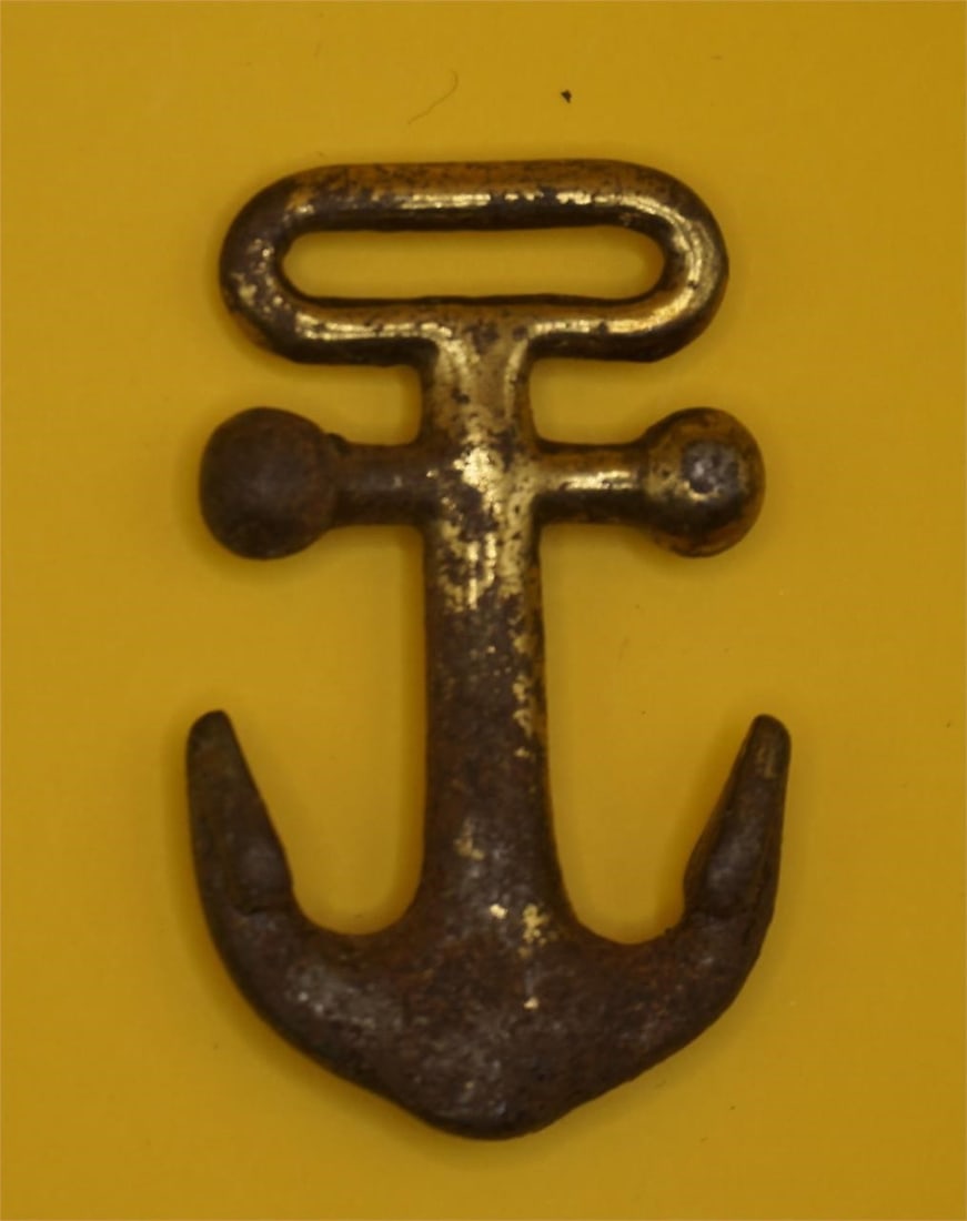 Hammock Anchor: This is a miniature anchor, approximately 2.75 inches long. The item has a patent date of "May 3, '81" (1881) embossed on it. It was likely created to look rustic, chipped, weathered, and worn. These