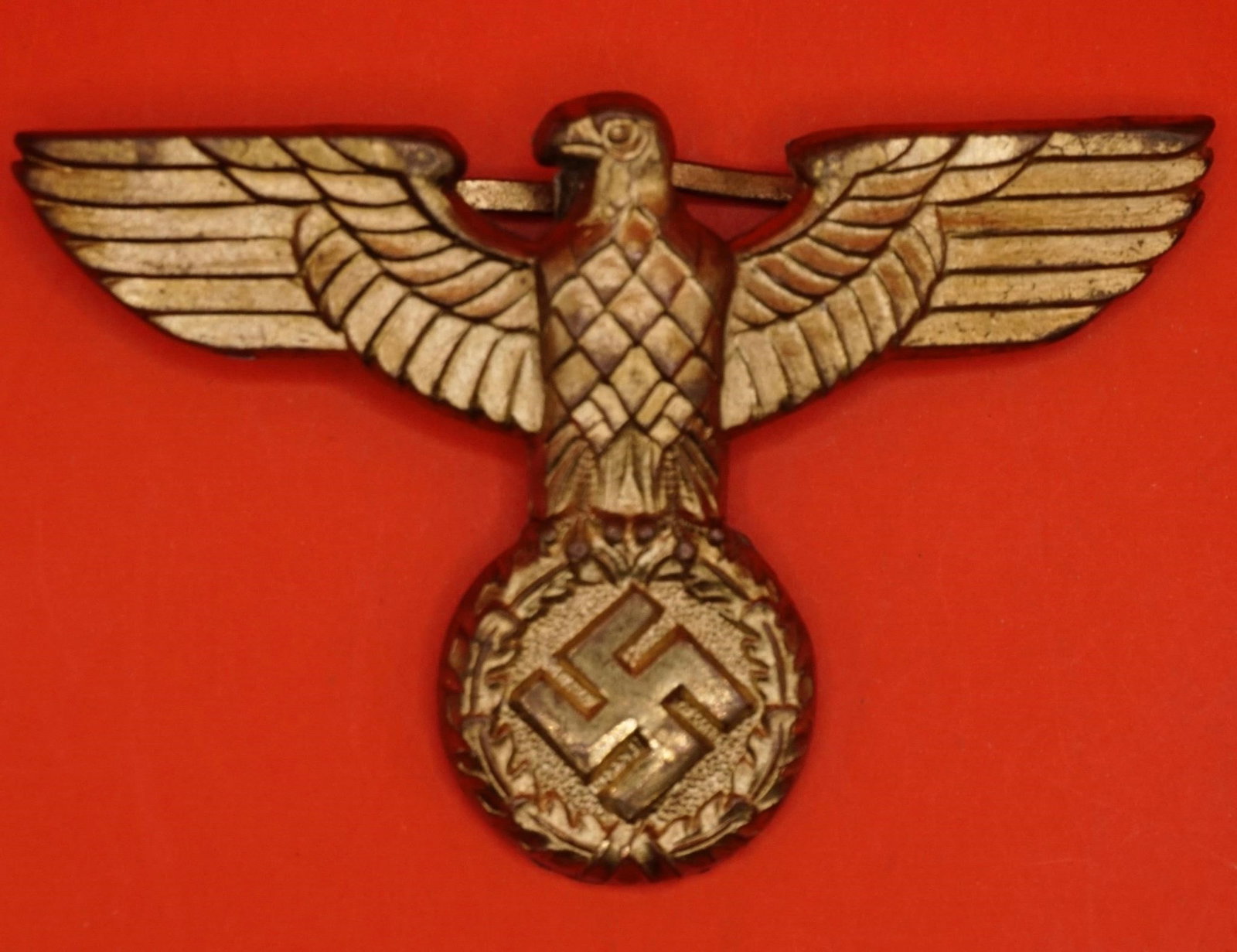 1939 German NSDAP SA/Political Visor Cap Eagle: Original 1939 pattern NSDAP (Nazi Party) SA/political visor cap eagle, silver-washed metal, hollow back, prongs intact, good used condition with minor wear. COA from Gettysburg Museum included.