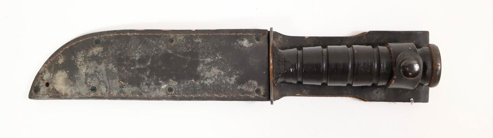 Vietnam War U.S. KA-BAR MK2 Fighting Knife: Original Vietnam War-era U.S. KA-BAR MK2 fighting knife by Camillus (marked "U.S. / CAMILLUS N.Y."), dating to circa 1962-1974. Overall length 11 3/8" with a 6 3/8" clip-point blade, shortened about 1
