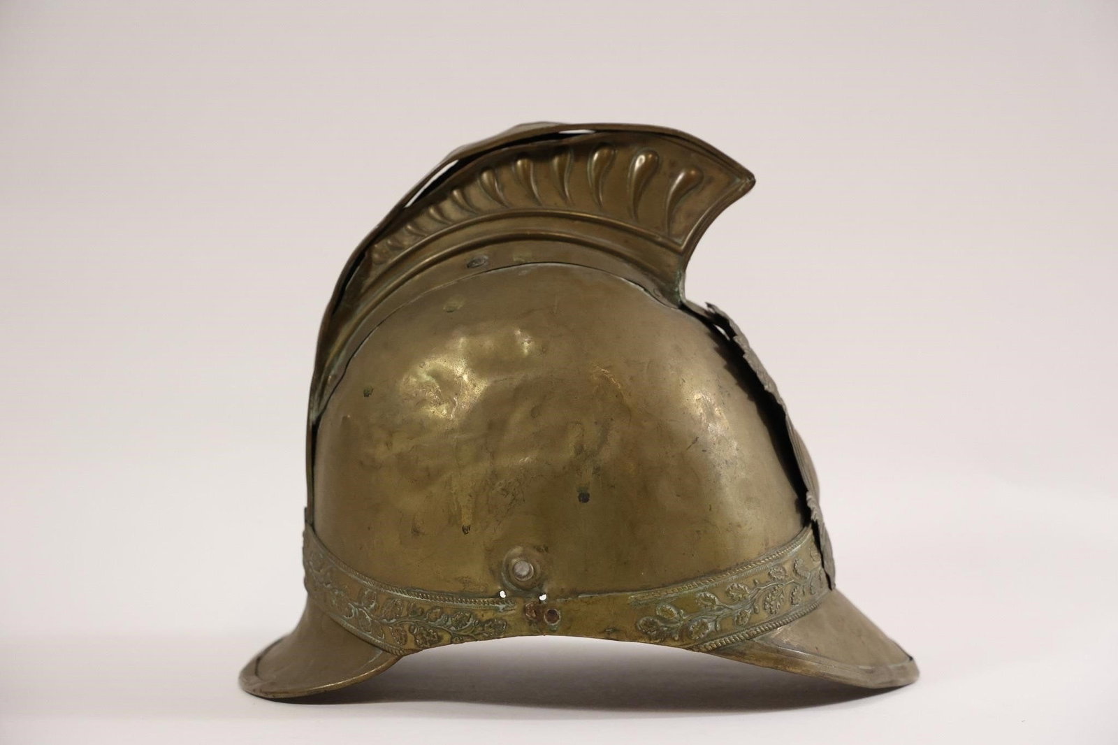 French Firefighter Helmet Model 1885: French firefighter helmet Model 1885 - Military helmet.French firefighter helmet, Model 1885 type 'Campagnard', originating from the Sapeurs-Pompiers of the commune of Lion-d'Angers (Maine-et-Loire