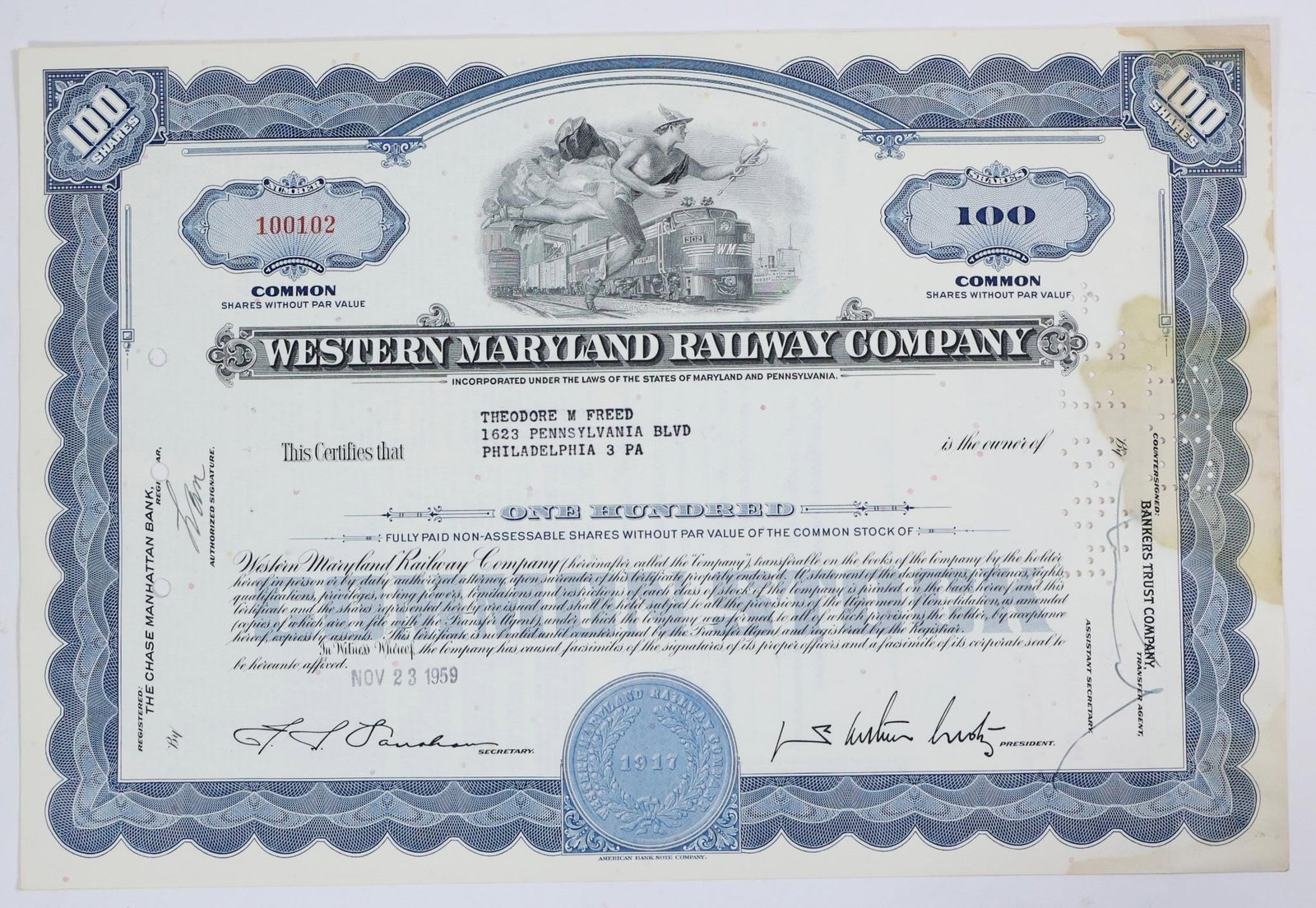 Western Maryland Railway Company Stock Certificate: A Western Maryland Railway Company stock certificate for 100 common shares issued to Theodore M. Freed in 1959. The certificate is for common shares without par value. It was issued on November 23, 19