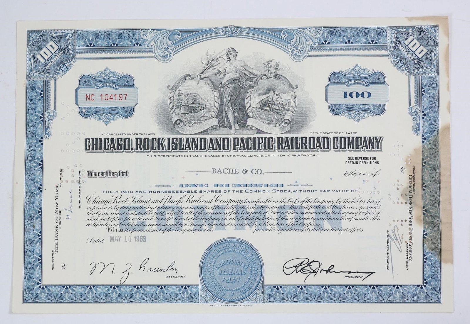 ChicagoRock Island&Pacific RR100 Share Certificate: A collectible Chicago, Rock Island and Pacific Railroad Company 100 shares stock certificate, dated May 10, 1963. The certificate is issued to "BACHE & CO." and features a vignette of a classical fema