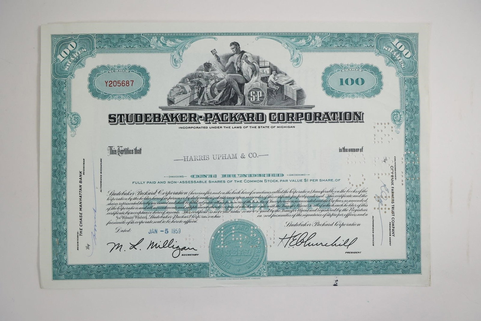 Studebaker-Packard Corporation 100-Share: A stock certificate from the Studebaker-Packard Corporation representing 100 shares, dated October 28, 1958.