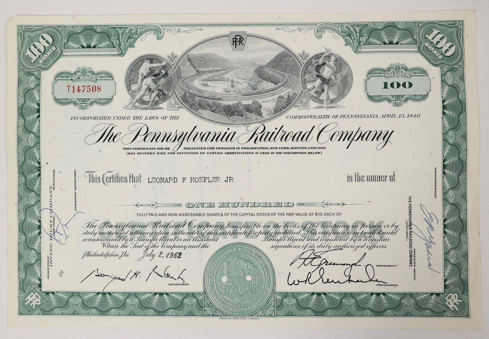 Pennsylvania Railroad Stock Certificate 1962: Pennsylvania Railroad Company stock certificate issued to Leonard F. Hoefler Jr. for 100 shares on July 2, 1962.