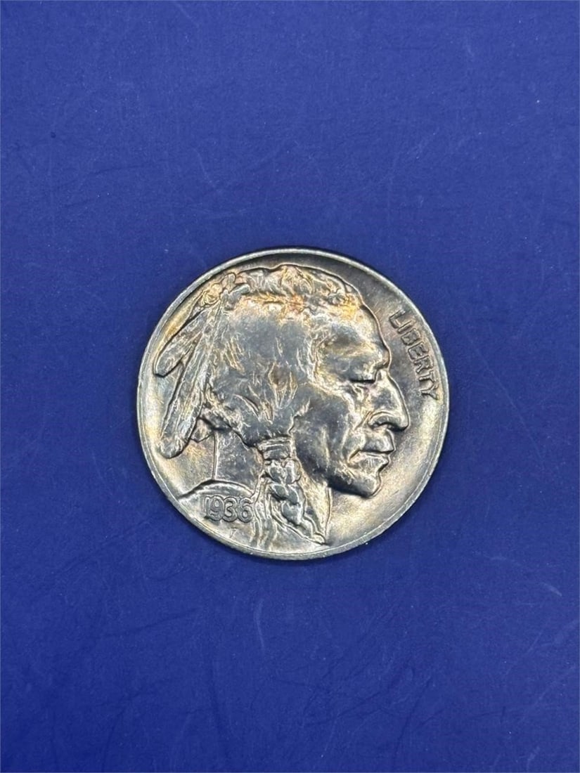 1936 Buffalo Nickel: Size: 0.8 inFive-cent copper-nickel coin was minted by the United States from 1913 to 1938 and was designed by sculptor James Earle Frase.