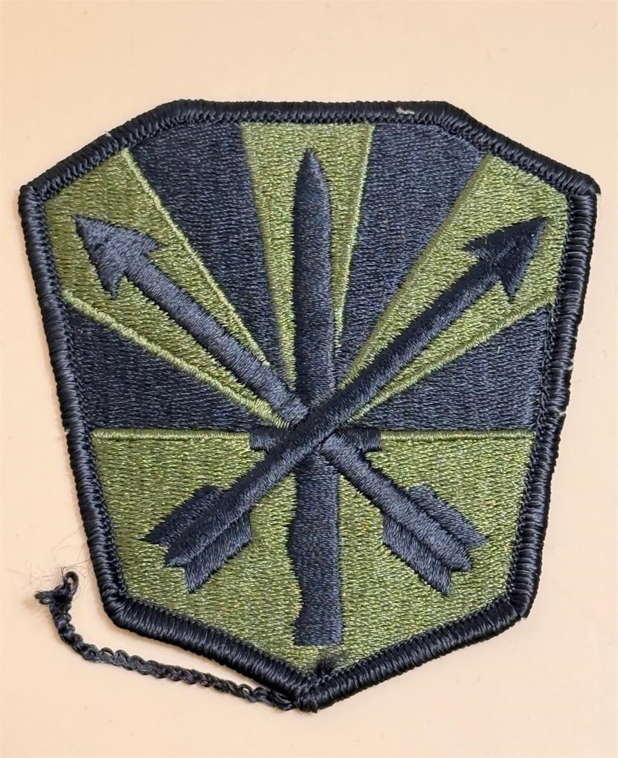 Arizona National Guard shoulder patch: Arizona National Guard shoulder sleeve insignia, or patch, for the Army's Operational Camouflage Pattern (OCP) uniform. The patch design incorporates elements of the Arizona state flag. The crossed