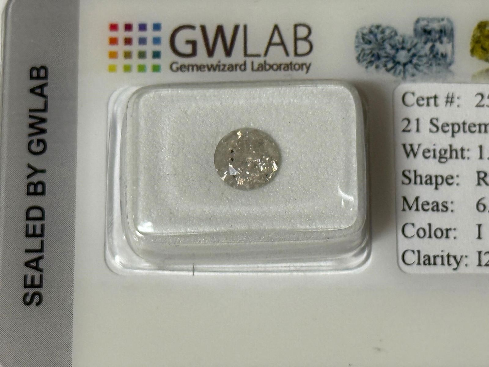 Natural 1.03 ct Round Diamond: Lab report number - 255907261037Diamond type - NaturalTotal carat weight - 1.03Cut grade - Very goodDiamond Clarity Grade - I2Diamond Colour Grade - IFluorescence - NoneLaboratory Report - Gemewizard