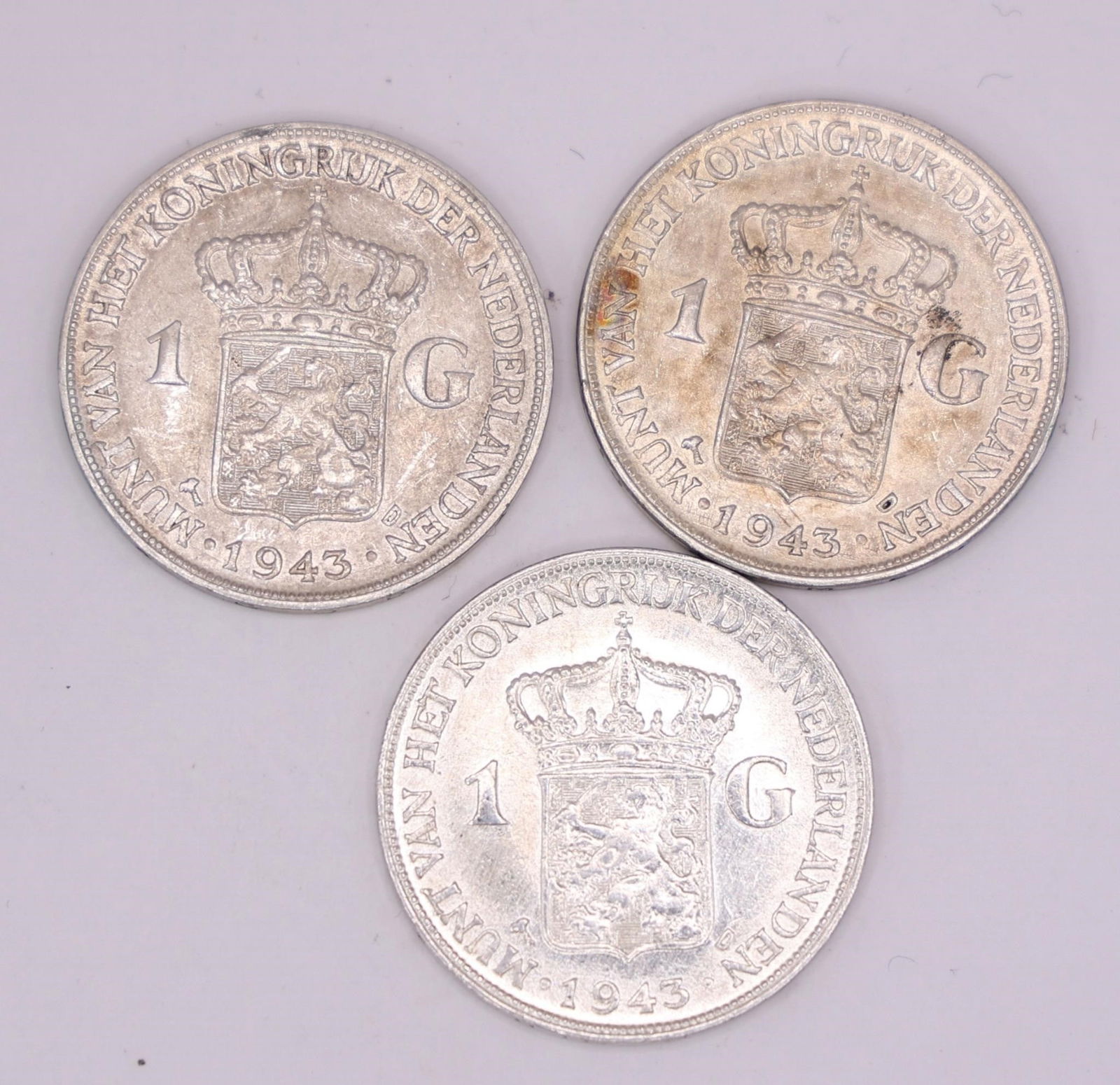1943 Netherlands Queen Wilhelmina Silver Gulden: Three 1943 Netherlands silver 1 Gulden coin featuring Queen Wilhelmina, struck in .720 silver.