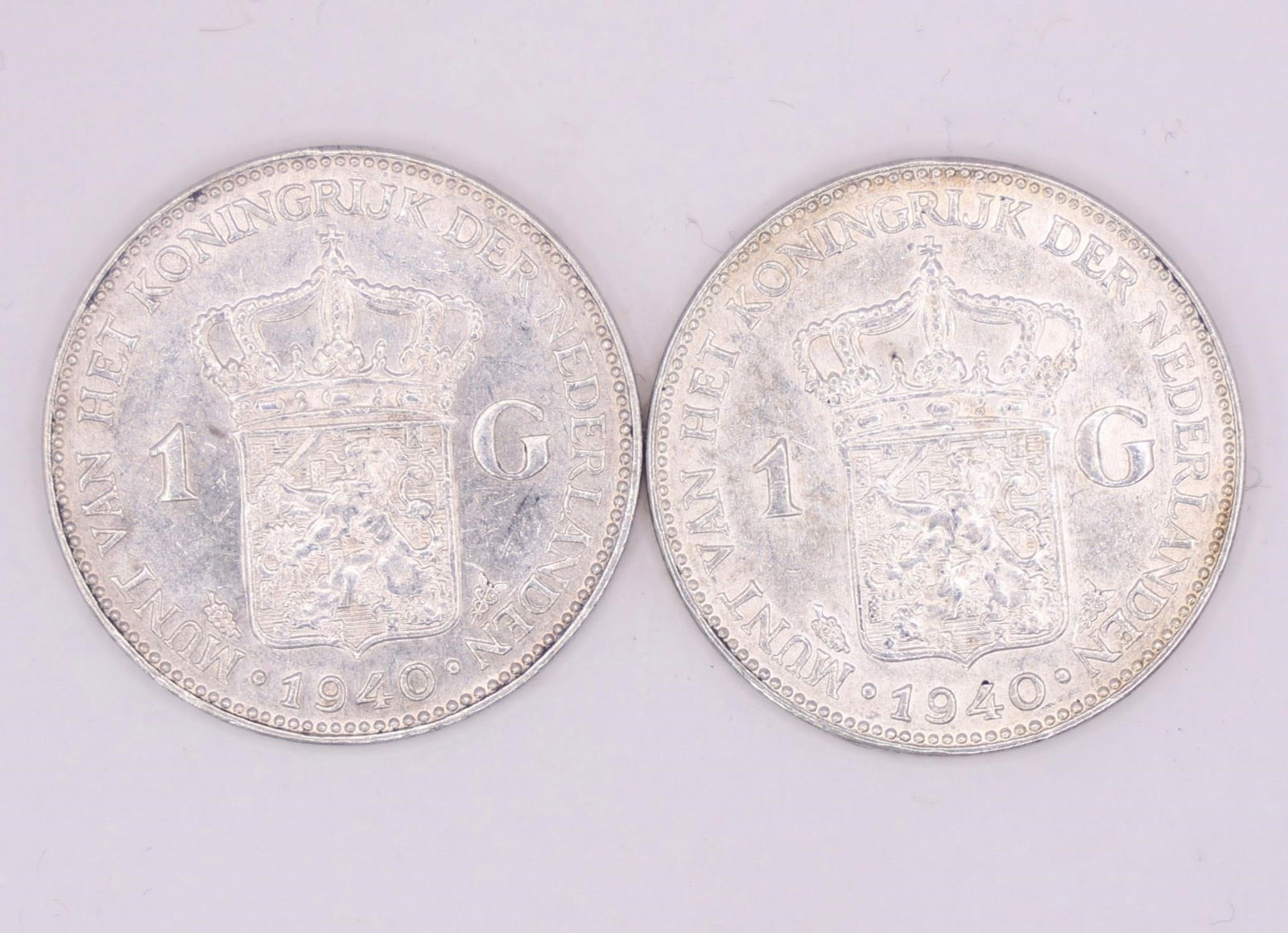 1940 Netherlands Queen Wilhelmina Silver Gulden: Two 1940 Netherlands silver 1 Gulden coin featuring Queen Wilhelmina, struck in .720 silver.