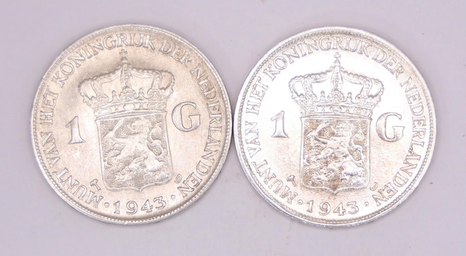 1943 Netherlands Queen Wilhelmina Silver Gulden: Two 1943 Netherlands silver 1 Gulden coin featuring Queen Wilhelmina, struck in .720 silver.
