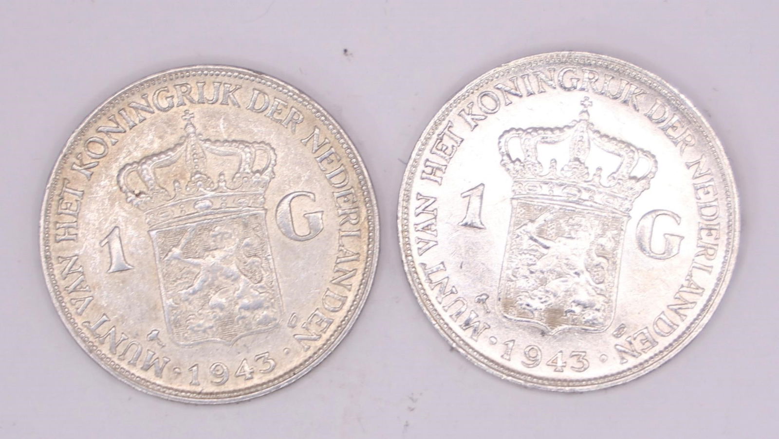 1943 Netherlands Queen Wilhelmina Silver Gulden: Two 1943 Netherlands silver 1 Gulden coin featuring Queen Wilhelmina, struck in .720 silver.