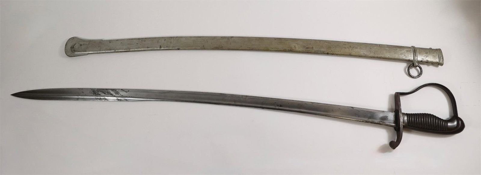 German WW1 M73 Prussian Artillery Sabre: WWI-era German M1873 Prussian artillery sabre by F.W. Holler, Solingen. Features a 76 cm curved, single-fullered blade dated 1916 with Imperial inspection marks, near-mint condition. Steel P-guard