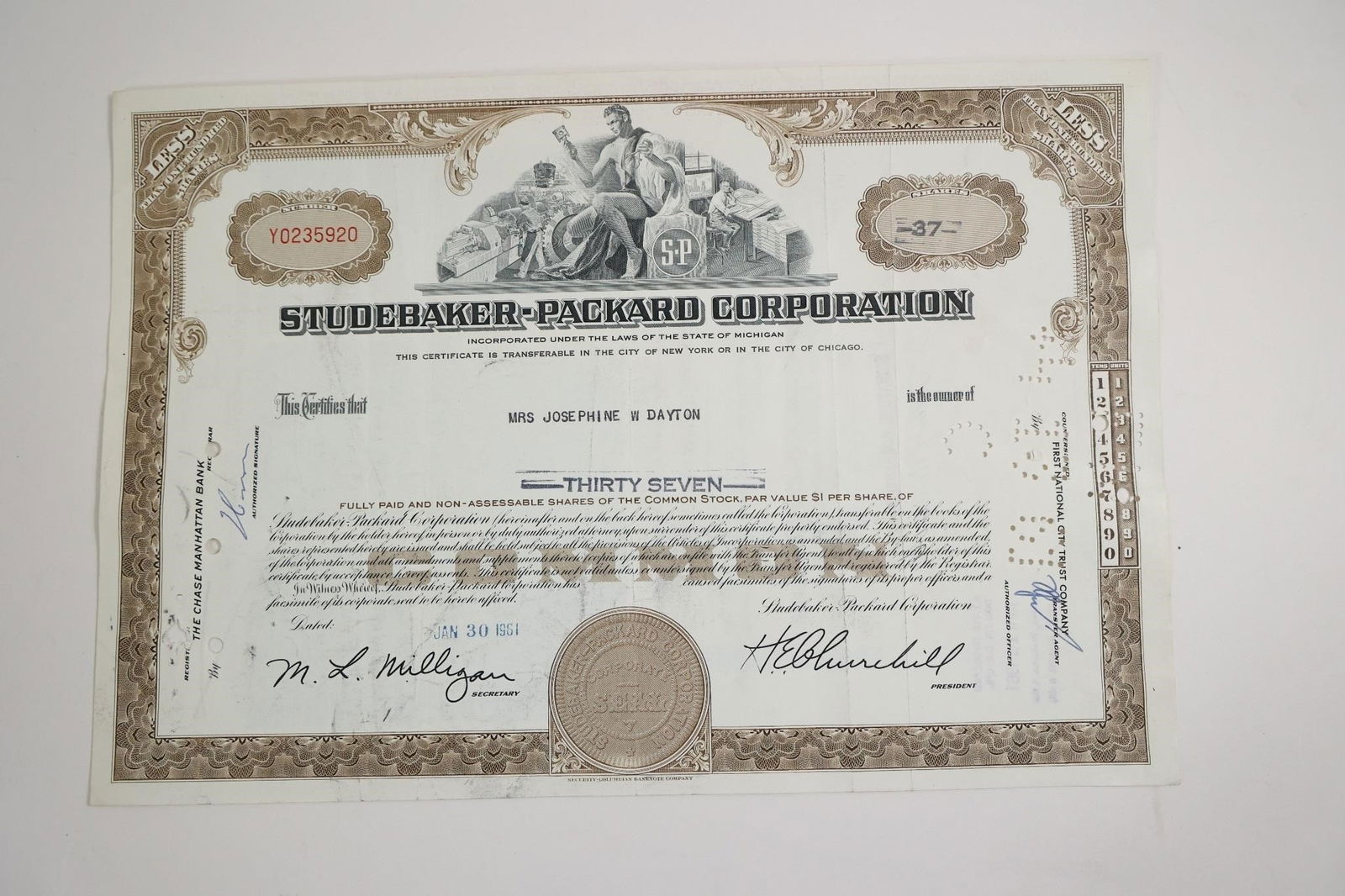 Studebaker-Packard Corporation Stock Certificate: A collectible stock certificate from the Studebaker-Packard Corporation, issued in the 1950s, valued for its historical significance and appeal to automotive memorabilia collectors.