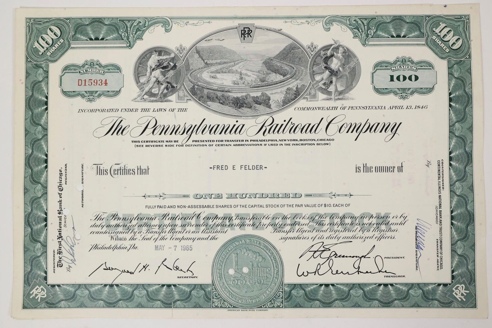 Pennsylvania Railroad Stock Certificate 1965: Pennsylvania Railroad Company stock certificate for 100 shares, issued on May 7, 1965. Green certificate featuring an engraved vignette of two trains traveling around the famous Horseshoe Curve in Pen
