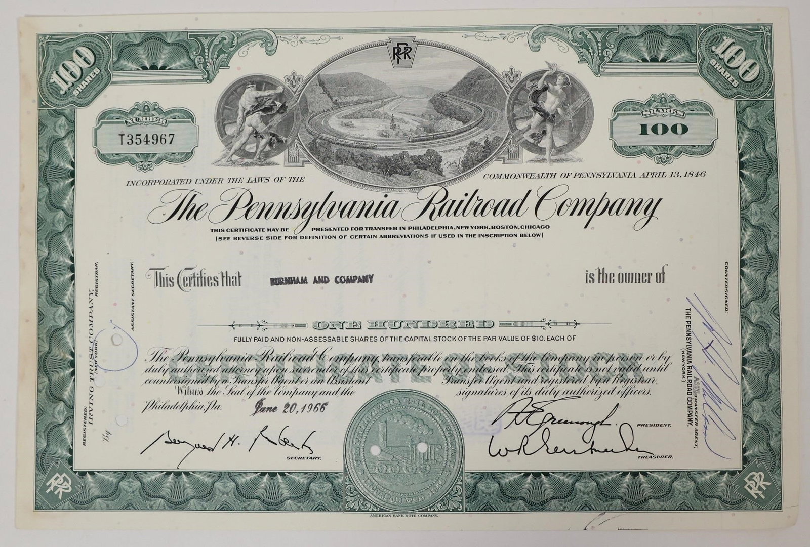 Pennsylvania Railroad Stock Certificate 1966: Collectible 100-share stock certificate from Pennsylvania Railroad Company, issued on June 20, 1966.