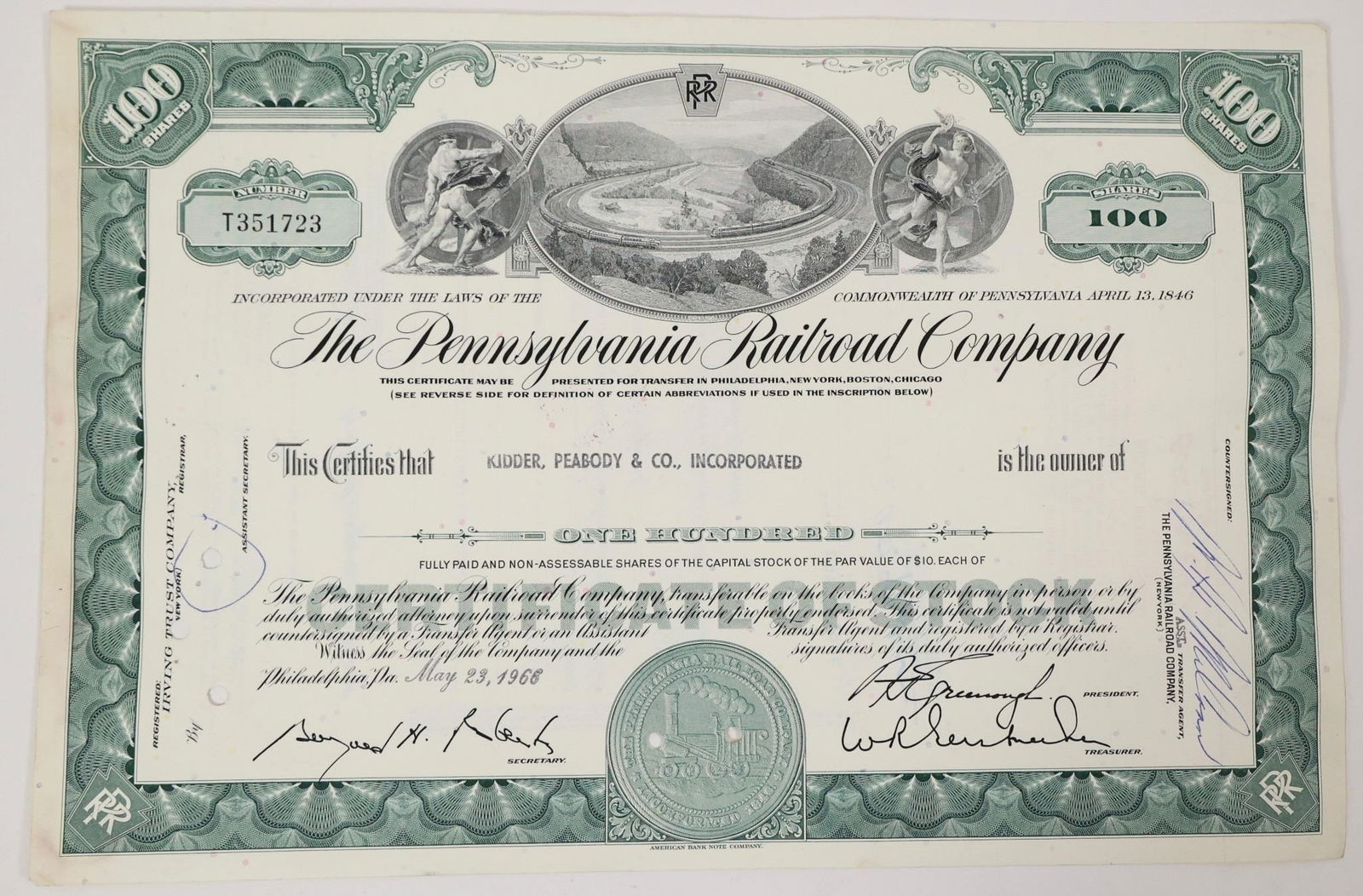 Pennsylvania Railroad Stock Certificate 1966: Vintage Pennsylvania Railroad Company 100-share stock certificate. Issued on May 23, 1966, the green certificate features a vignette of two trains traveling around the iconic Horseshoe Curve.