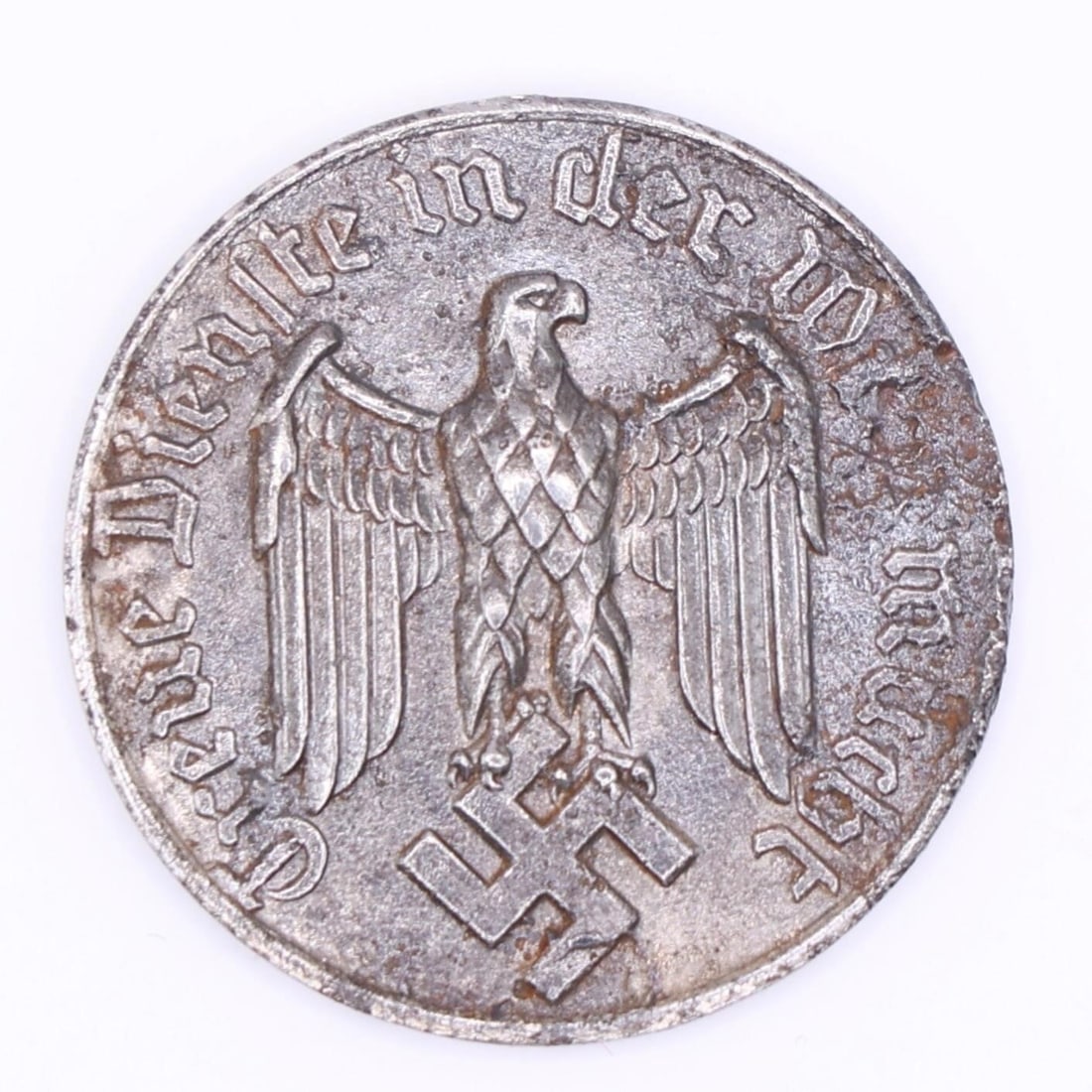 WWII German 4-Year Service Medal: This is a German Wehrmacht long-service medal issued during WWII for four years of military service. One side shows the number 4 within a decorative wreath, and the other features the period's