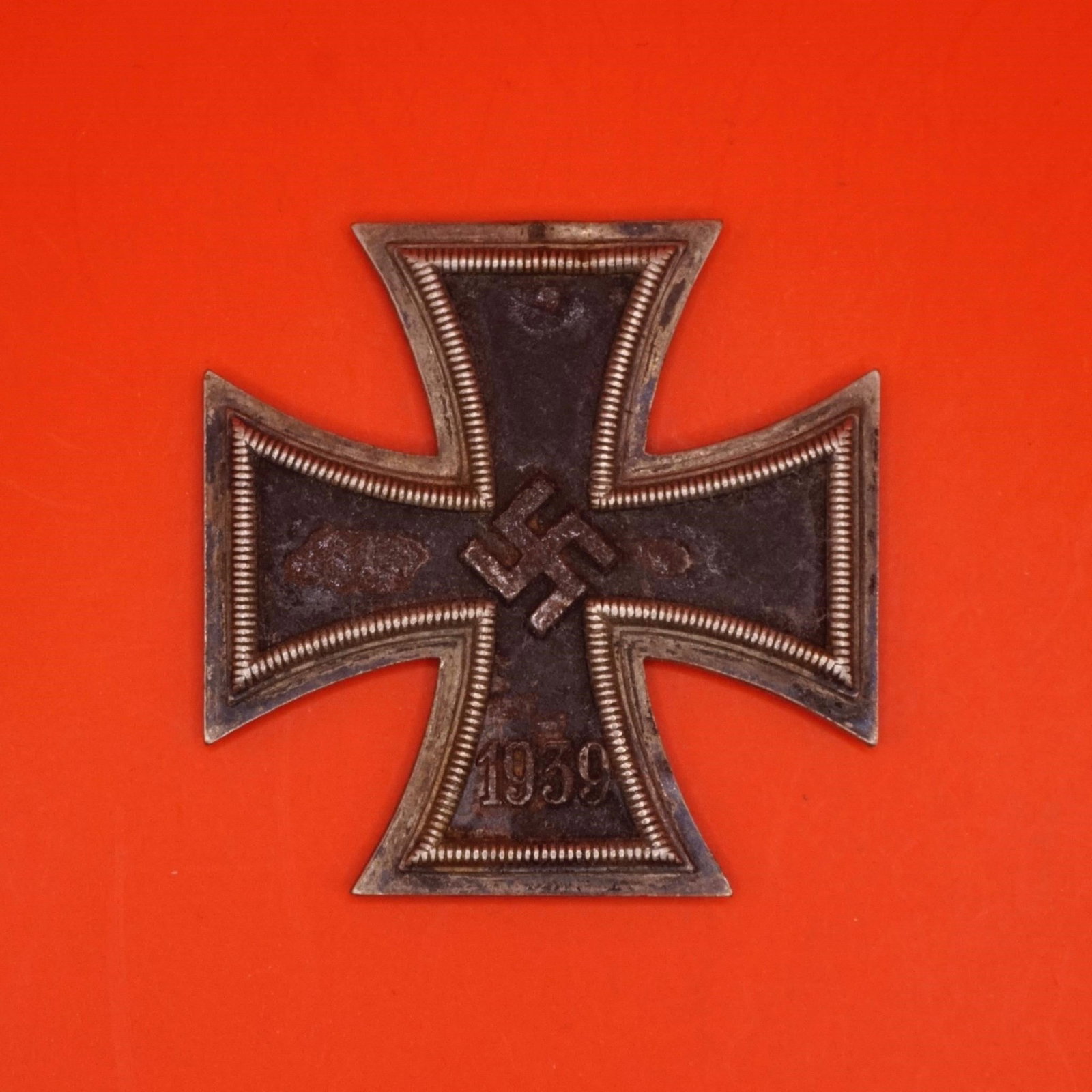 German WWII Iron Cross First Class 1939: WWII German Iron Cross First Class 1939. A well-preserved example showing period wear and honest aging, offered as a single original item. Suitable for a WWII militaria collection or display.