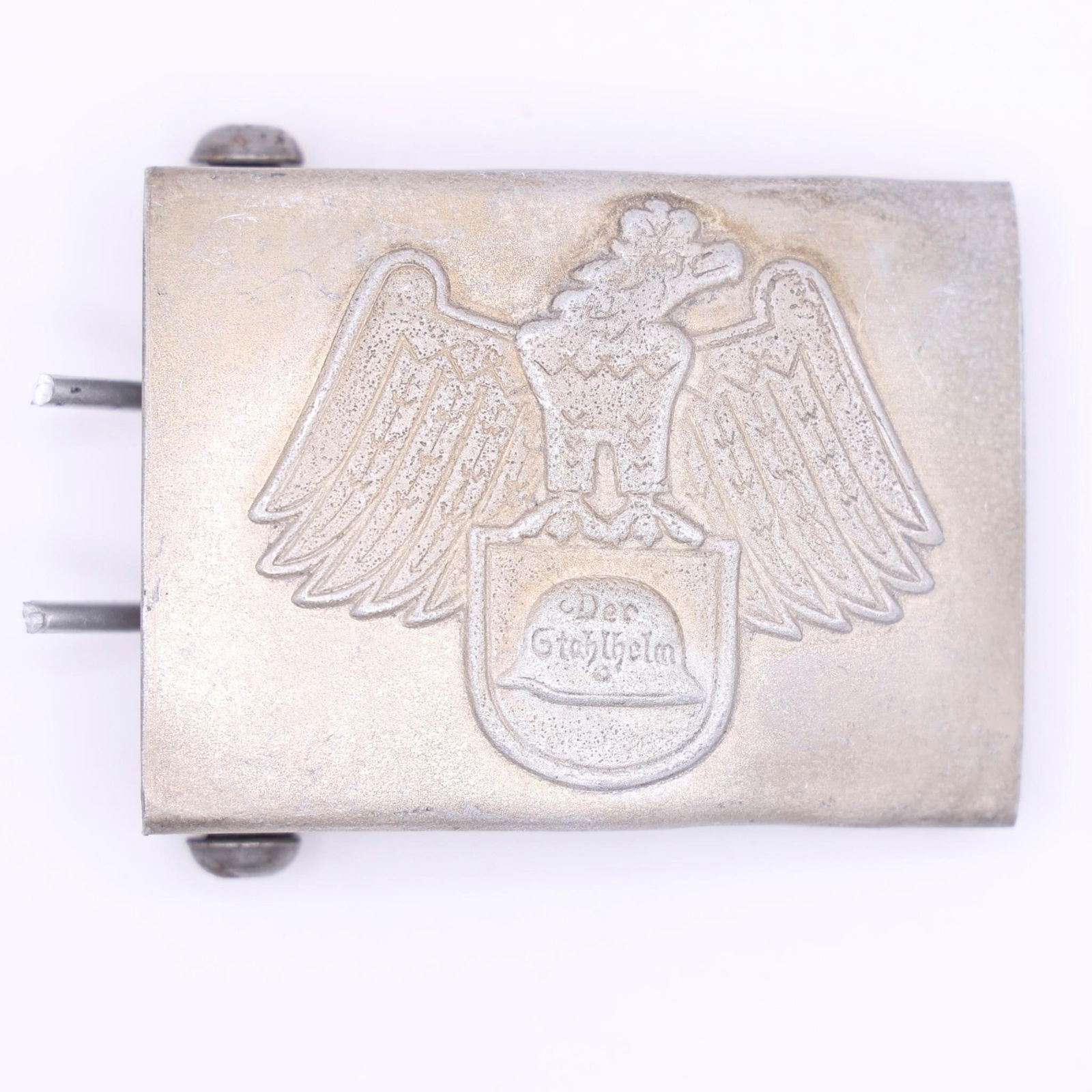 Der Stahlhelm Member's Belt Buckle: Constructed of dark grey-painted magnetic metal, the obverse displaying a raised crowned German national eagle grasping a Stahlhelm emblem. The reverse features a belt loop with dual attachment