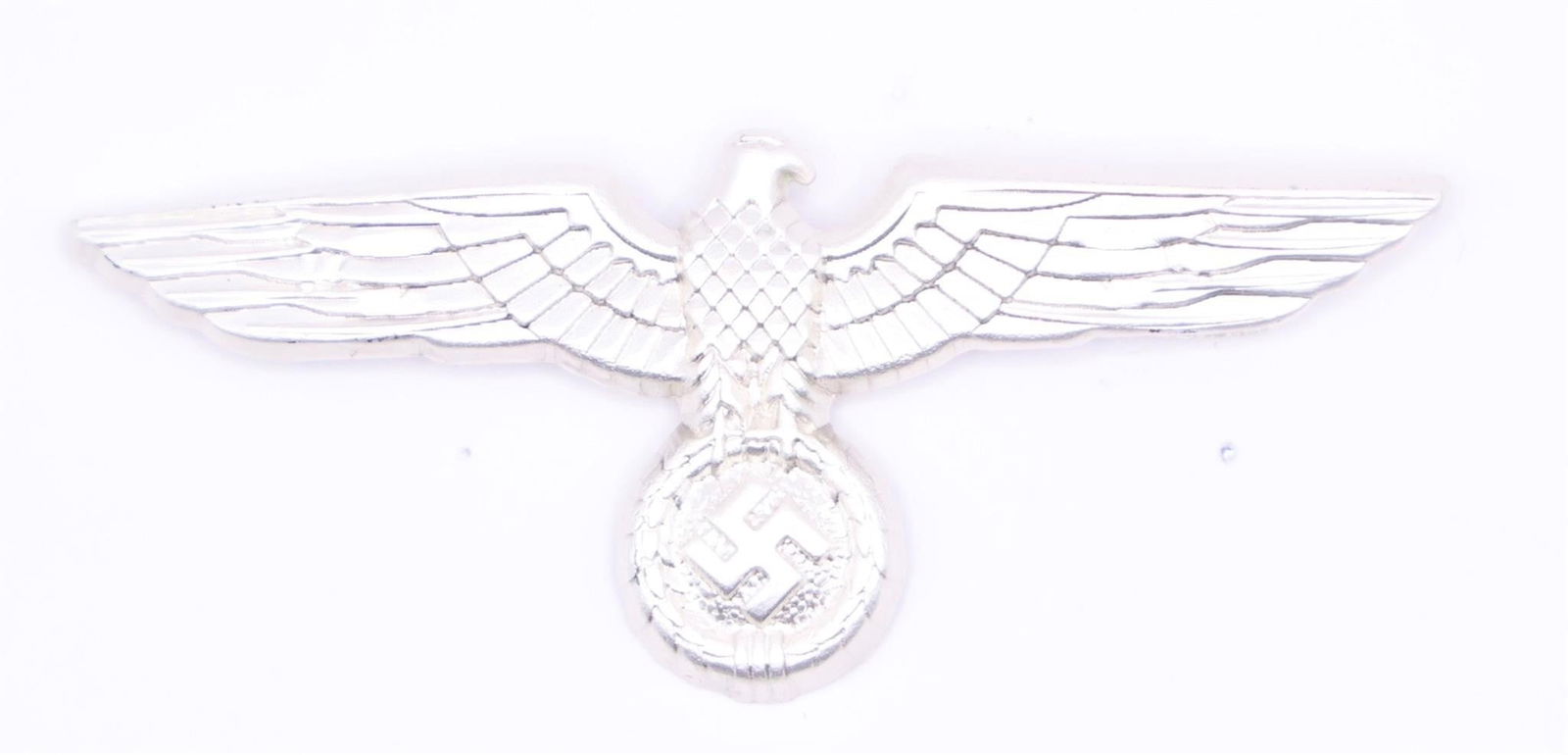 German Heer Visor Cap Eagle Insignia: The Heer (German Army) visor cap eagle was introduced in 1935 as part of the standardized insignia of the Wehrmacht and remained in use throughout World War II. Worn on officer and enlisted visor